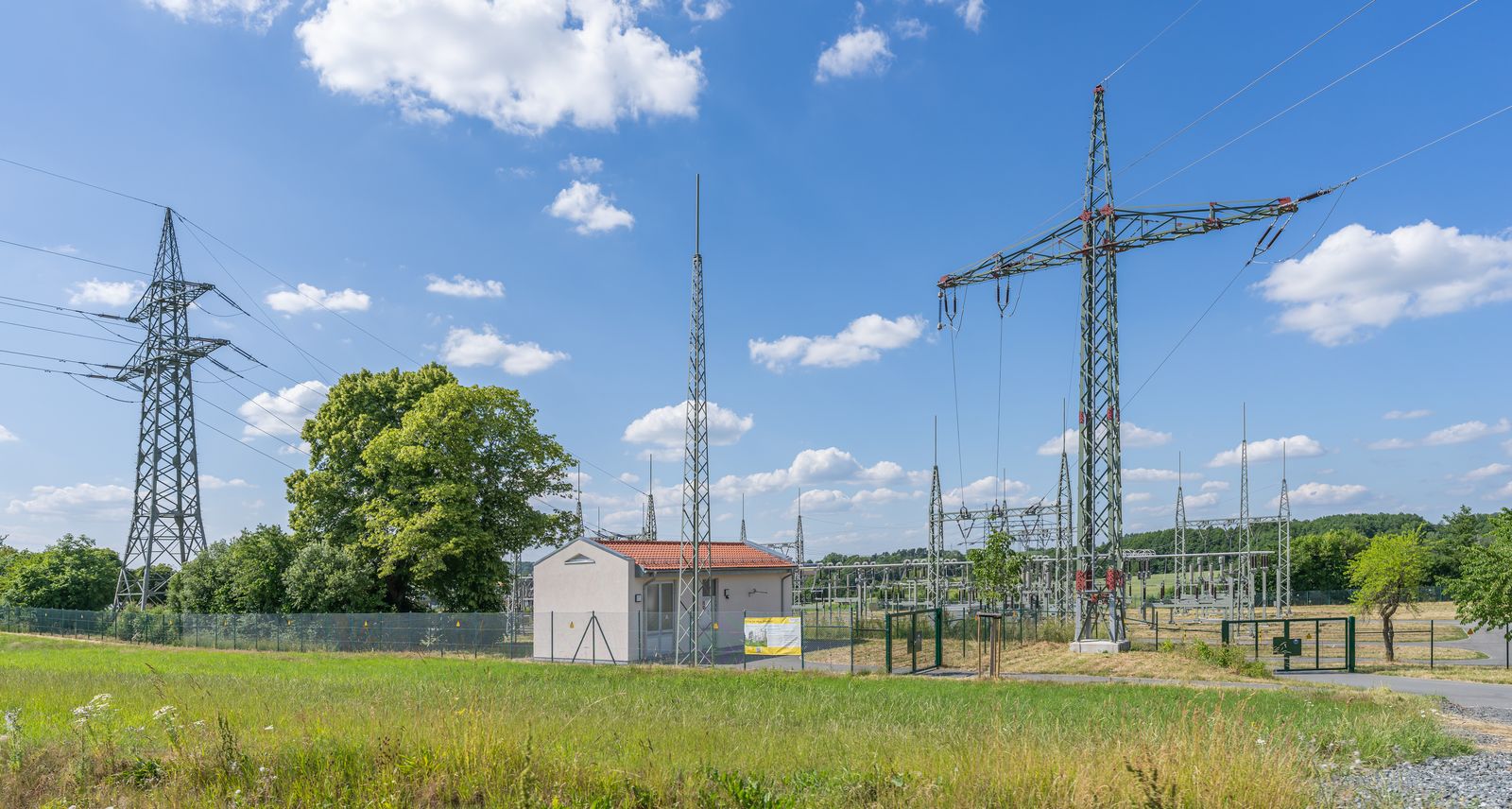 High-voltage substation at dusk